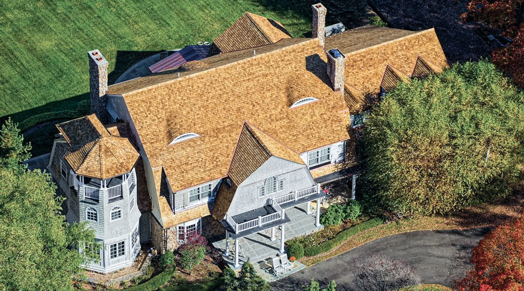 Elevated view of a completed cedar roof on a large residence